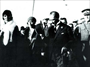 1930 – Yalova İskelesi’nde kendisini karşılayanları selâmlıyor